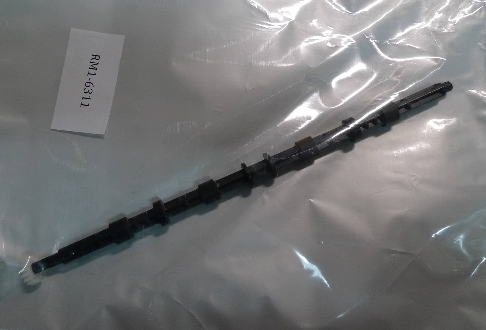 Вал выхода бумаги из печки HP LJ P3015/M521/M525 (RM1-6311)